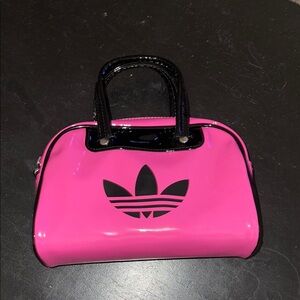Brand New Mini Adidas Patent Pink and Black hand bag with shoulder strap.